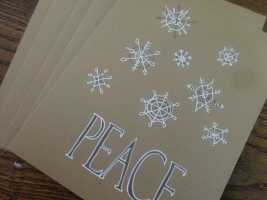 Simple holiday designs on Earth friendly recycled kraft paper.